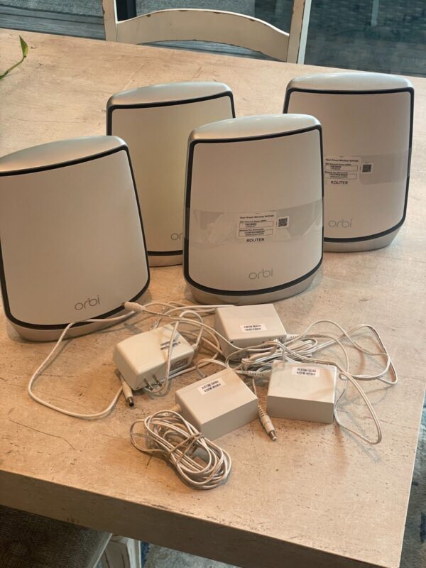 4 Netgear Orbi RBR850 Routers (READ; FOR PARTS)